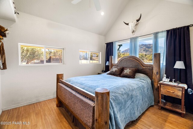 6850 N Harris Dr, Prescott, AZ 86305 - bedroom with wood finished floors, high vaulted ceiling, ceiling fan, recessed lighting, and baseboards