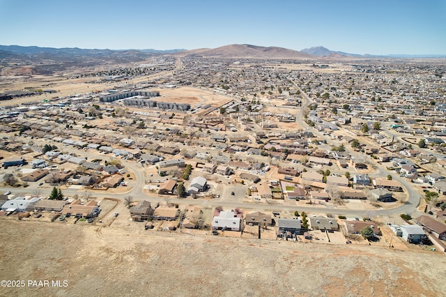 drone / aerial view with a residential view and a mountain view