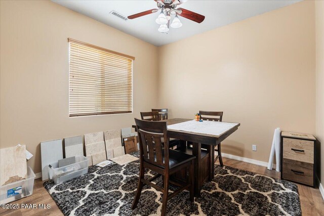 1395 N Rustlers Roost, Dewey-Humboldt, AZ 86327 - dining area featuring ceiling fan and wood finished floors