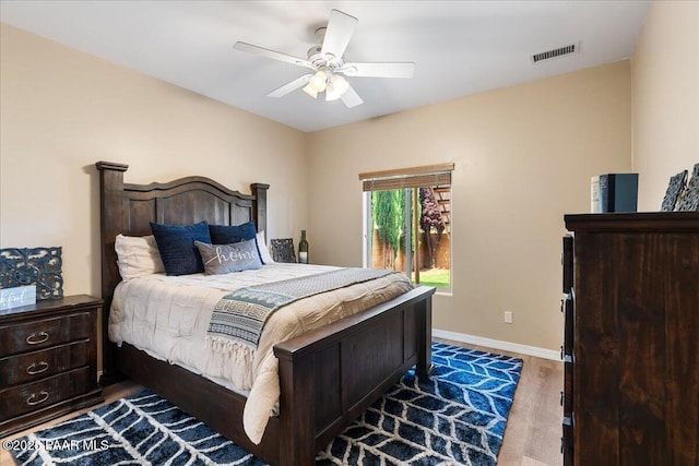 1395 N Rustlers Roost, Dewey-Humboldt, AZ 86327 - bedroom featuring wood finished floors and a ceiling fan