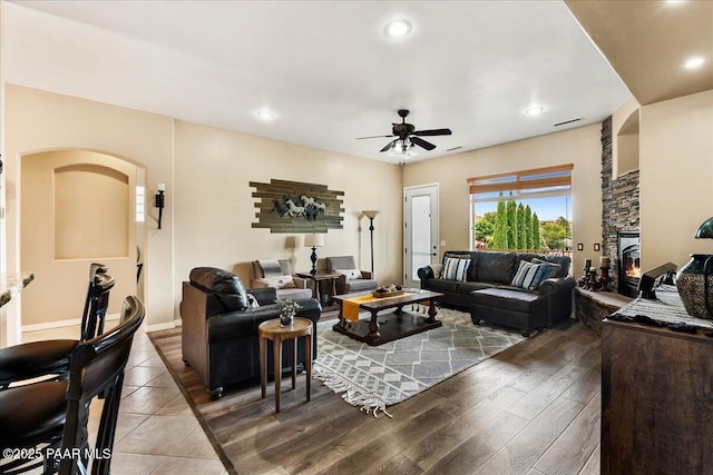 1395 N Rustlers Roost, Dewey-Humboldt, AZ 86327 - living room featuring a ceiling fan, wood finished floors, recessed lighting, and a fireplace