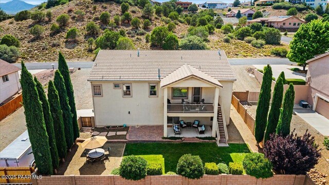 1395 N Rustlers Roost, Dewey-Humboldt, AZ 86327 - rear view of house featuring a patio, a fenced backyard, stucco siding, and a mountain view