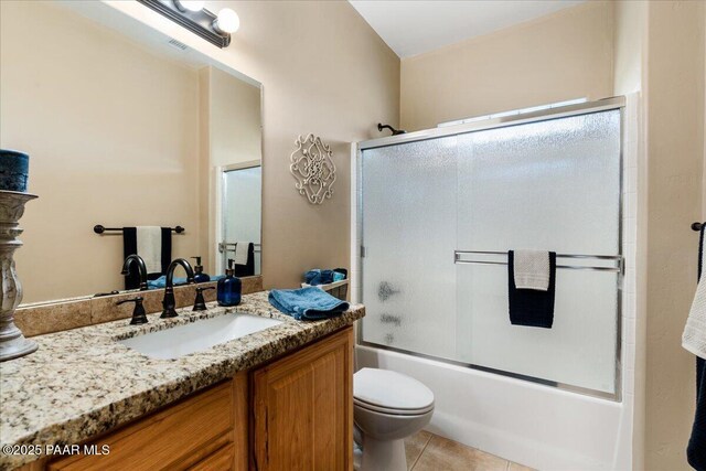1395 N Rustlers Roost, Dewey-Humboldt, AZ 86327 - bathroom featuring vanity, bath / shower combo with glass door, and tile patterned floors