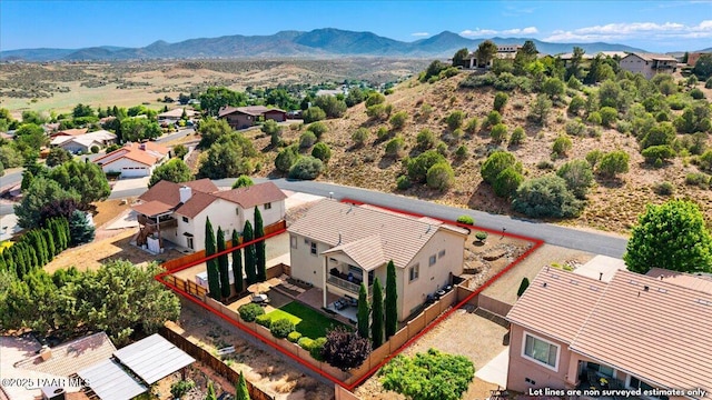 1395 N Rustlers Roost, Dewey-Humboldt, AZ 86327 - aerial perspective of suburban area with mountains and property boundaries highlighted