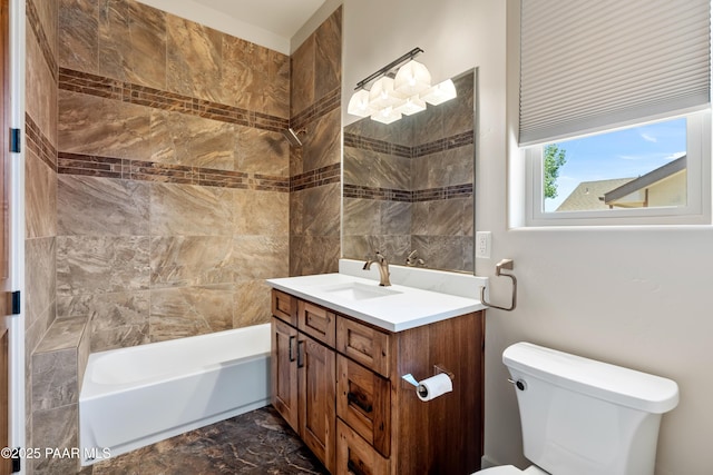 bathroom with vanity, shower / tub combination, and toilet