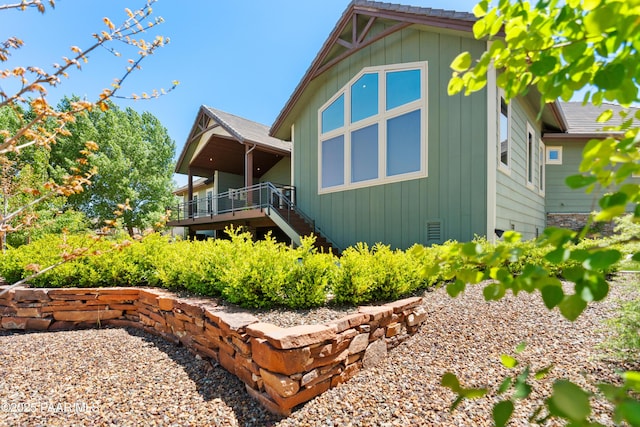 view of home's exterior with a deck