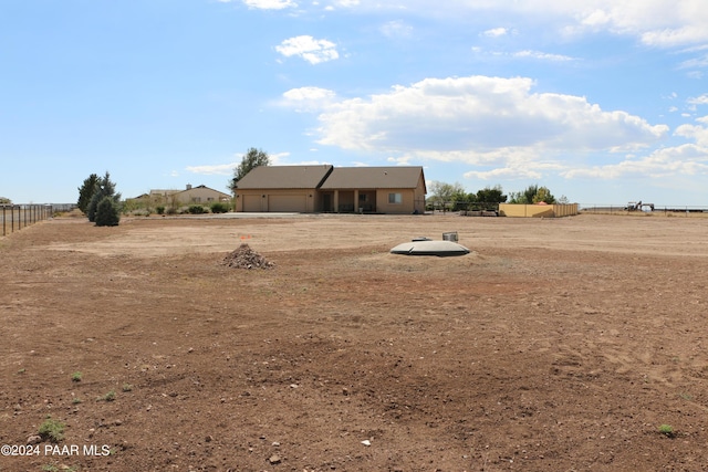 view of yard with a garage