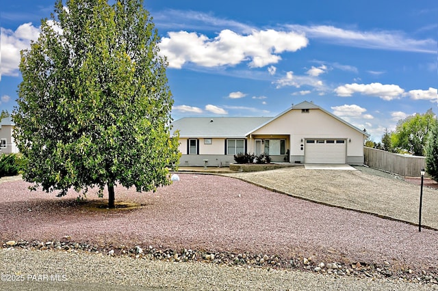 ranch-style home with a garage