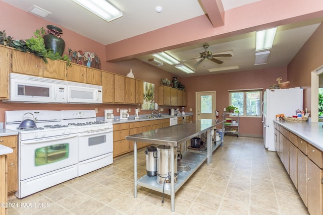 kitchen featuring ceiling fan, white appliances, and sink