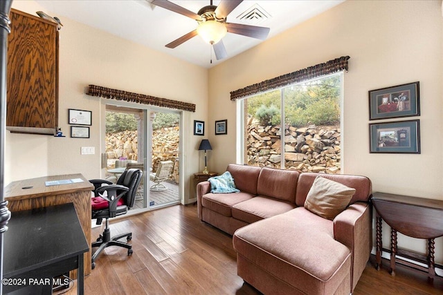 office with hardwood / wood-style flooring and ceiling fan