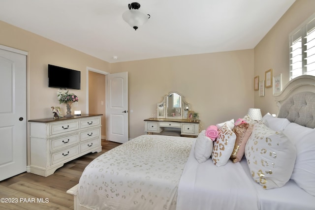 bedroom featuring light hardwood / wood-style floors