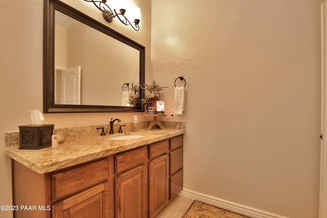 bathroom featuring tile patterned floors and vanity