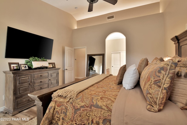 bedroom with light hardwood / wood-style flooring and ceiling fan