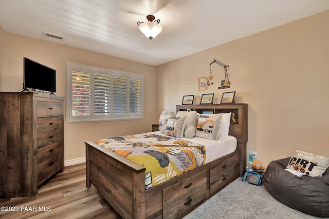 bedroom featuring light wood-type flooring