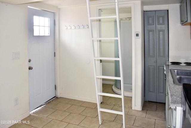 interior space featuring light tile patterned floors