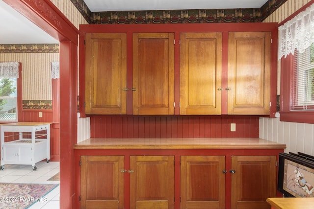 kitchen with light tile patterned floors