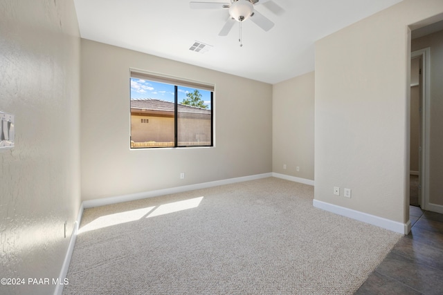 spare room featuring ceiling fan