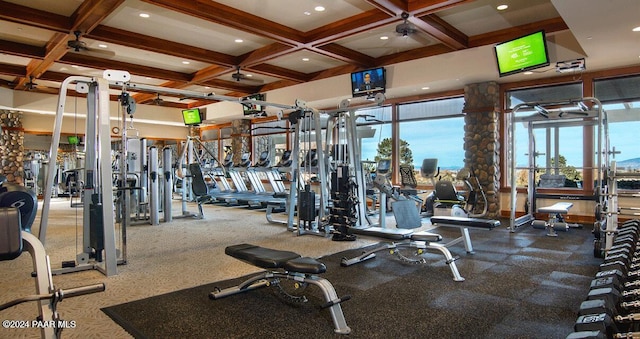 gym featuring coffered ceiling