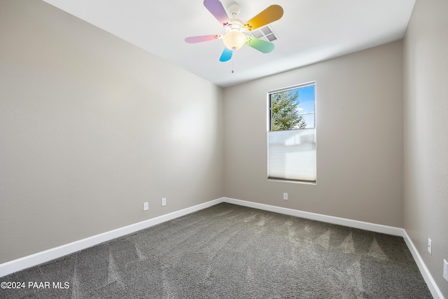 carpeted empty room with ceiling fan