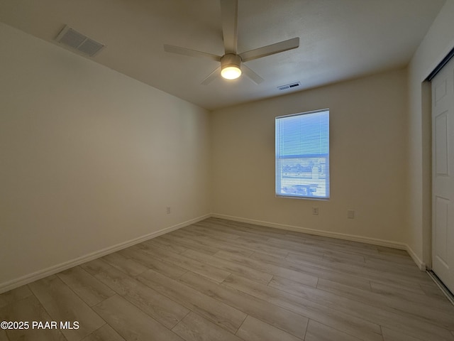 unfurnished room featuring ceiling fan and light hardwood / wood-style flooring