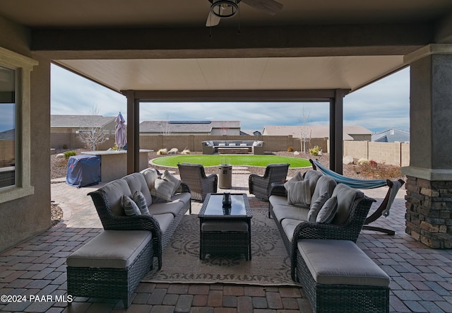 view of patio / terrace with an outdoor hangout area and ceiling fan