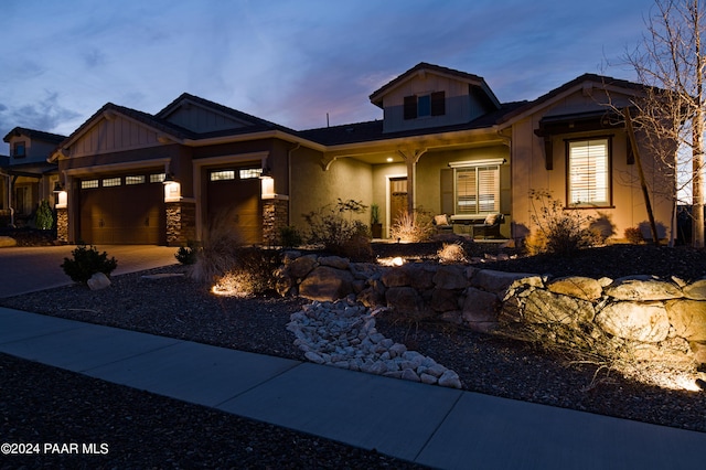 view of front of property with a garage