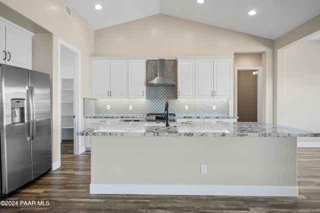 kitchen featuring white cabinets, wall chimney exhaust hood, dark hardwood / wood-style floors, and stainless steel refrigerator with ice dispenser