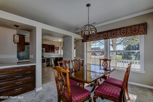 1836 Bond Cir, Prescott Valley, AZ 86314 - dining space with light carpet, a chandelier, and plenty of natural light
