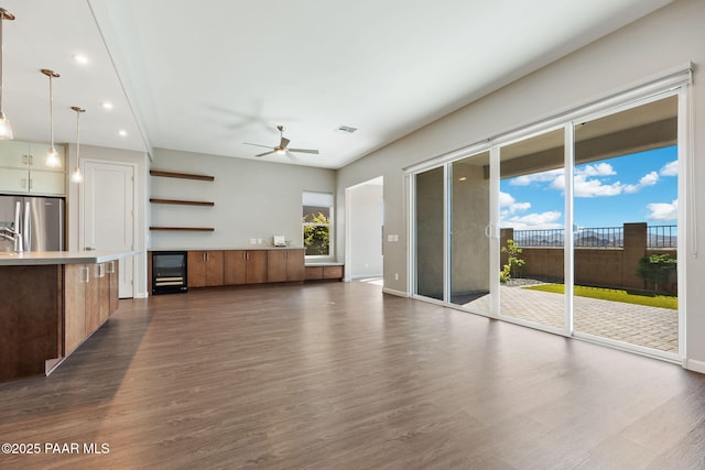 5248 Tranquil Bluff Way, Prescott, AZ 86301 - unfurnished living room featuring a ceiling fan, dark wood-style floors, recessed lighting, and baseboards
