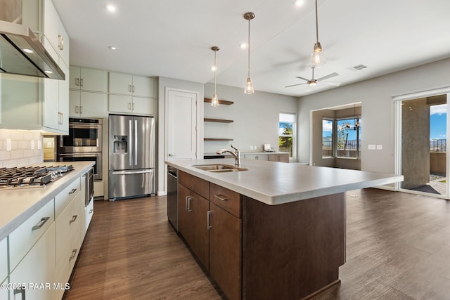 5248 Tranquil Bluff Way, Prescott, AZ 86301 - kitchen featuring appliances with stainless steel finishes, a sink, extractor fan, light countertops, and recessed lighting