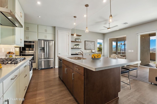 5248 Tranquil Bluff Way, Prescott, AZ 86301 - kitchen with appliances with stainless steel finishes, a sink, extractor fan, light countertops, and recessed lighting
