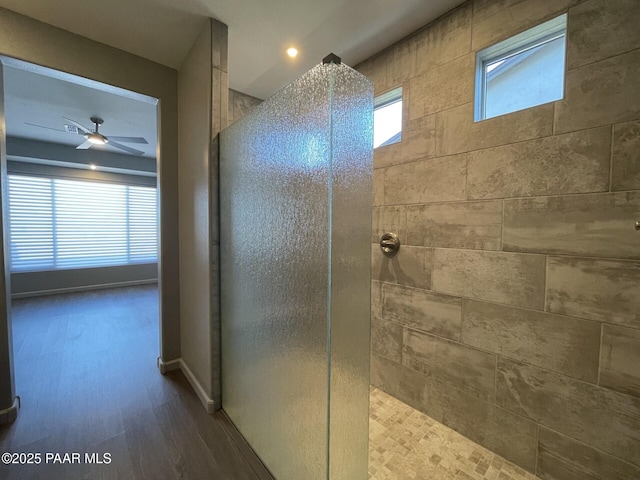 5248 Tranquil Bluff Way, Prescott, AZ 86301 - bathroom featuring a walk in shower, a ceiling fan, and wood finished floors