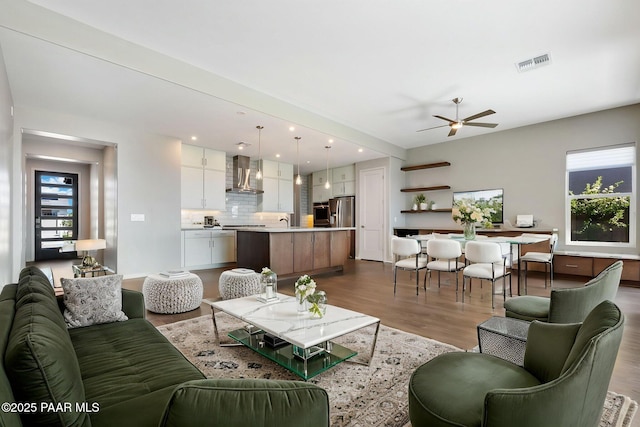 5248 Tranquil Bluff Way, Prescott, AZ 86301 - living room with wood finished floors, healthy amount of natural light, a ceiling fan, and recessed lighting