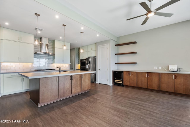 5248 Tranquil Bluff Way, Prescott, AZ 86301 - kitchen featuring wall chimney exhaust hood, appliances with stainless steel finishes, dark wood-type flooring, backsplash, and recessed lighting