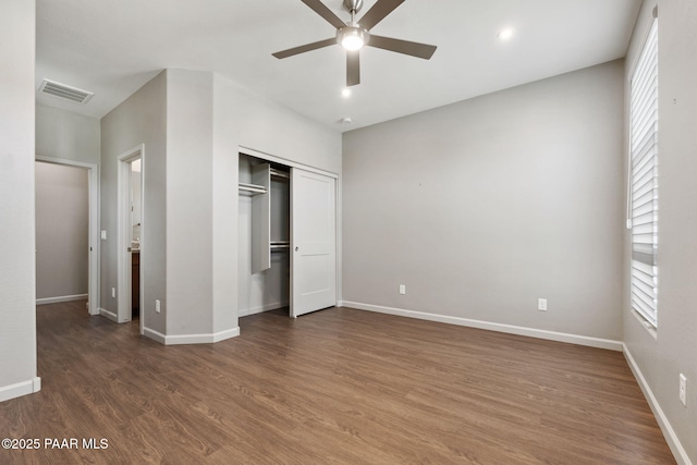 5248 Tranquil Bluff Way, Prescott, AZ 86301 - unfurnished bedroom with wood finished floors, baseboards, a closet, and a ceiling fan