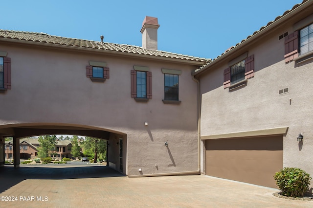 exterior space featuring a garage