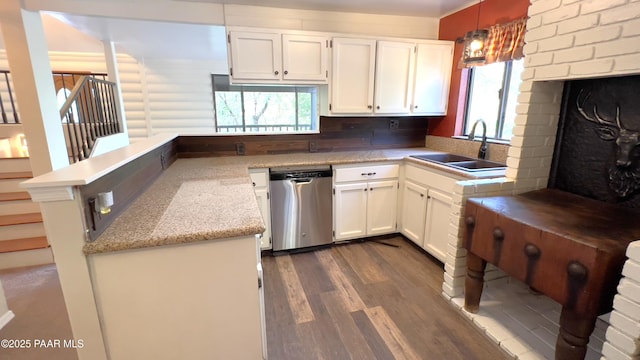 885 S Rancho Vista Dr, Prescott, AZ 86303 - kitchen with dishwasher, a sink, healthy amount of natural light, and white cabinetry