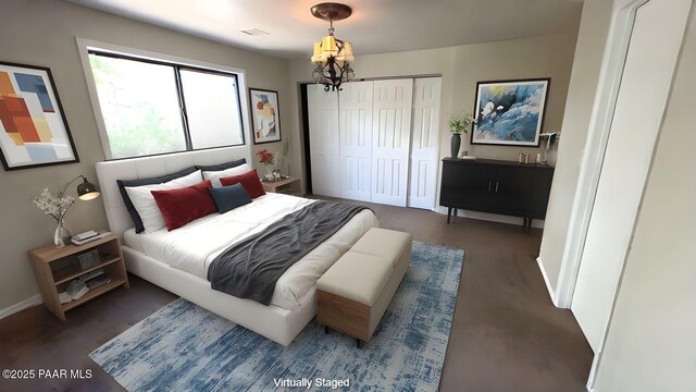 885 S Rancho Vista Dr, Prescott, AZ 86303 - bedroom with a chandelier, baseboards, and a closet