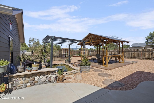 view of patio featuring a pergola