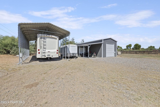 view of outbuilding featuring a carport