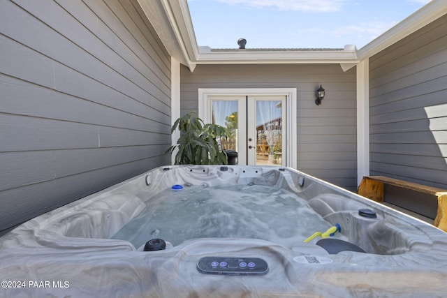 exterior space featuring a hot tub