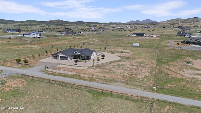 bird's eye view featuring a mountain view and a rural view