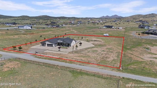 aerial view featuring a mountain view and a rural view