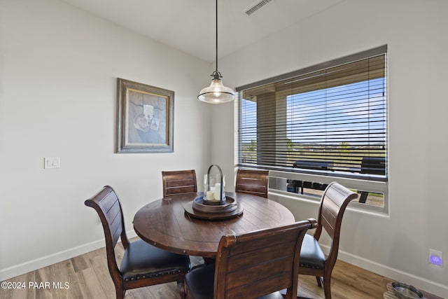 dining space featuring light hardwood / wood-style flooring