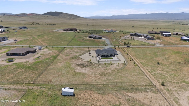 bird's eye view with a mountain view and a rural view