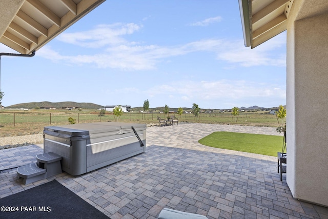 view of patio / terrace with a mountain view