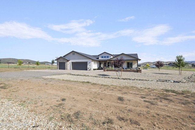 ranch-style house featuring a garage