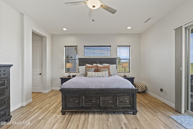 bedroom featuring ceiling fan and light hardwood / wood-style flooring