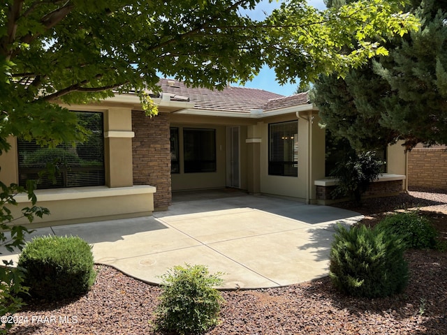 view of front of house featuring a patio area