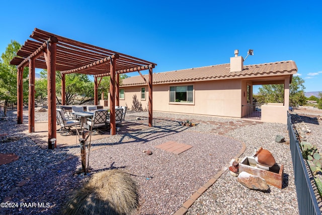 exterior space featuring a pergola